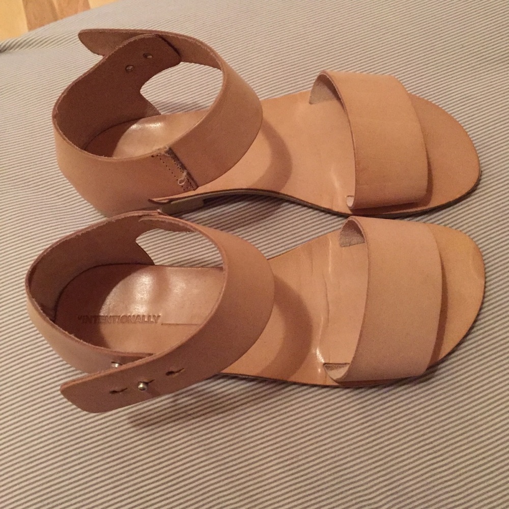 Intentionally blank leather sandals